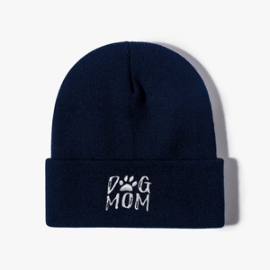 Classic navy blue knit beanie with white Dog Mom embroidery for casual winter wear