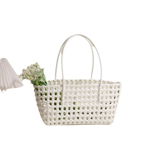 Minimalist white hollow woven plastic beach tote bag with top handles for vacation