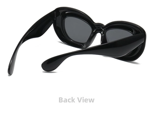 Rear view detail of wide-frame bubble sunglasses with smooth integrated nose pads
