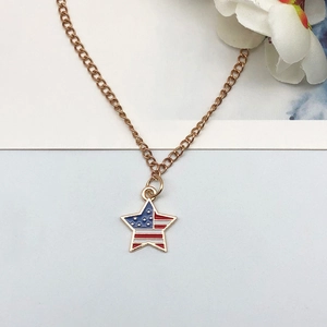 Star-shaped American flag pendant necklace with red white and blue enamel on gold chain