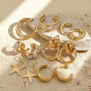 5-piece set of gold geometric multi-layer hoop and star earrings with faux diamonds