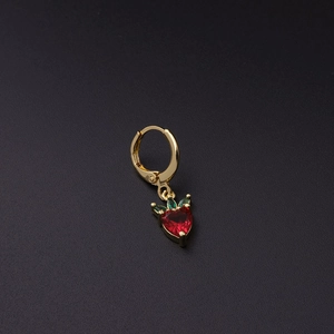 Detailed view of strawberry earring with red heart gemstone and green leaf accents