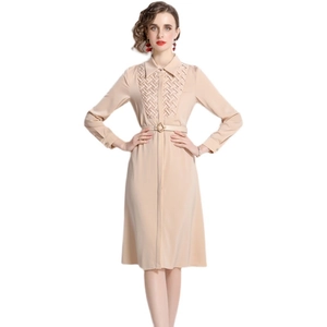 Elegant beige long sleeve shirt dress with a waist belt and woven bodice detail