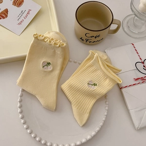 Lace trim crew socks in cream with floral embroidery and textured knit details