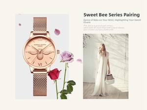Détail d'une montre en maille or rose avec cadran abeille 3D complexe et chiffres romains