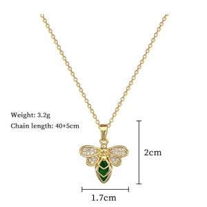 Detailed size specifications for gold bee pendant necklace with green gems and crystals