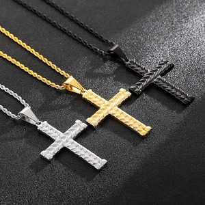 Three men's retro titanium steel cross necklaces in silver, gold, and black colors