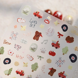 Cartoon bear nail art stickers with red cars and floral patterns on transparent backing