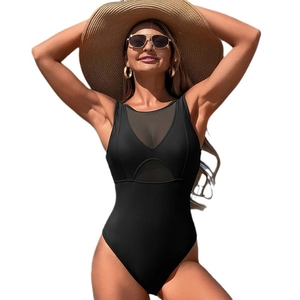 Elegant black one-piece swimsuit with mesh panels and high-cut leg for vacation style