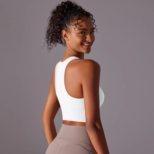 Slim fit white racerback sports tank top and pink yoga leggings with high elastic fabric