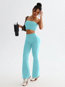 Sky blue seamless yoga set with cropped tank top and high waist flared leggings