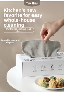 Macro view of gray microfiber kitchen cleaning cloth with waffle texture in dispenser box