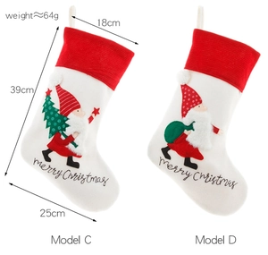 Detail of white Nordic embroidered Christmas stockings with gnomes and size dimensions
