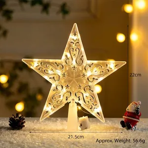 Detail of 22cm lighted Christmas tree topper star with warm LED and scroll pattern