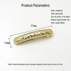 Glossy golden metallic spring hair clip with hammered texture, 77mm minimalist barrette