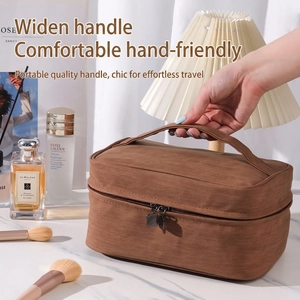 Brown corduroy large capacity makeup bag with wide handle for professional travel storage