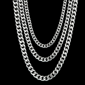 Three-piece set of silver stainless steel Cuban link necklaces in bold hip-hop style
