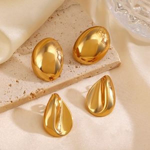 Minimalist gold titanium steel earrings in oval and leaf shapes with mirror finish
