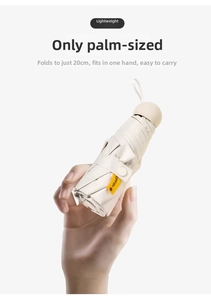 Compact beige capsule umbrella with 20cm height and UPF50+ UV protection rating