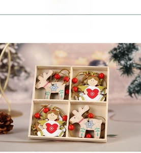 Detail of 4-piece wooden Christmas pendants with reindeer and angels in a wooden box