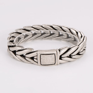 Detailed close-up of antique silver stainless steel chunky chain bracelet with square clasp