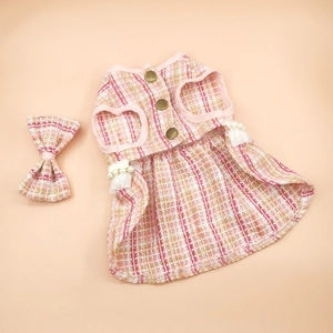 Pink tweed pet dress detail with vintage metal buttons, pearl tassels and matching bow
