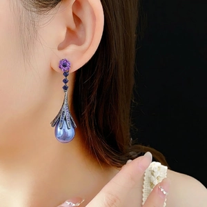 Floral stud earrings with purple zircons and large faux pearls for elegant women