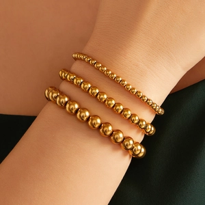 Three-piece 18K gold plated stainless steel bead bracelet set with polished finish