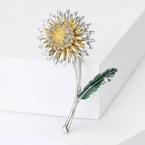 Broche pissenlit minimaliste en métal bicolore avec émail vert et cristaux clairs