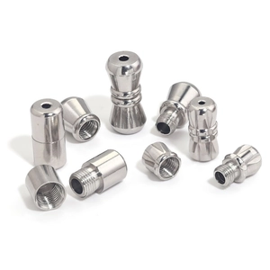Close-up of silver screw-clasp connectors for pearl necklaces and jewelry making