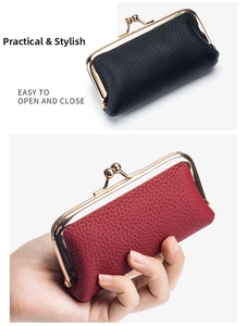 Detailed view of mini leather coin purses in black and red with gold metal clasps