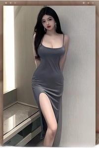 Close-up of slim fit gray dress featuring thin straps and high side slit detail