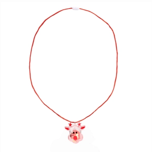 Close-up of a glowing transparent reindeer pendant on a red cord festive necklace