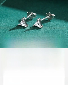 Detail of S925 sterling silver stud earrings featuring hand-set triangle zircons