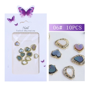 Detail of 10PCS heart and teardrop nail art charms with iridescent inlay and gold frame