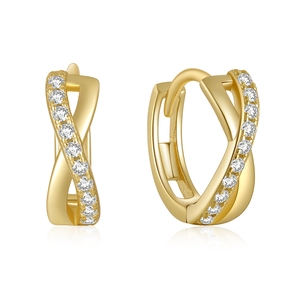 Macro shot of gold infinity twist earrings with sparkling clear cubic zirconia stones