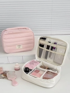 Quilted makeup bags in pink and white with large capacity and organized compartments