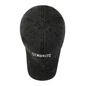 Charcoal grey washed cotton baseball cap with ST. MORITZ embroidery and six-panel crown