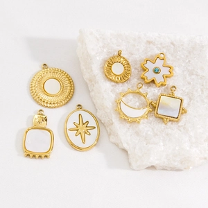 Polished 14K gold plated stainless steel pendants with white shell and blue gemstone