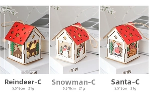 Three Nordic wooden Christmas house ornaments with glowing LED light and hanging strings