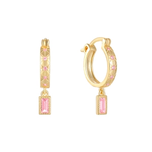 Detail of gold hoop earrings with quilted texture and rectangular pink gemstone drops