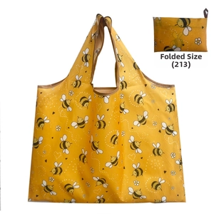 Foldable yellow Oxford fabric shopping bag with cute bee pattern and compact folded view