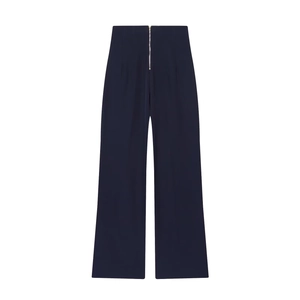 Pantalon large taille haute bleu marine avec fermeture éclair en métal argenté sur fond blanc