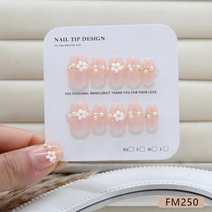 French cat eye press-on nails with handmade white flowers and gold pearls display