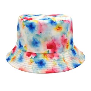 Detailed view of colorful tie-dye bucket hat with durable brim stitching and twill fabric