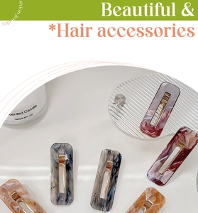 Close-up of rectangular marble texture hair clips with gold alloy duckbill clip back