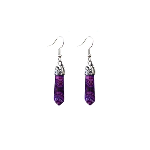 Detail of purple hexagonal crystal drop earrings with silver engraved metal hooks