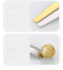 Details des verdickten Griffs und spiegelpolierten Edelstahls in Gold und Silber