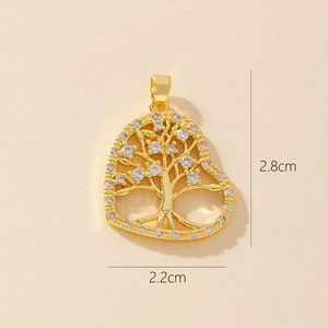 Golden heart tree of life pendant with zirconia stones measuring 2.8cm by 2.2cm