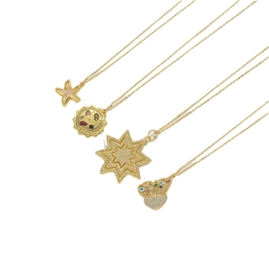 Golden starfish sun and butterfly necklaces with colorful zircon stones on white background